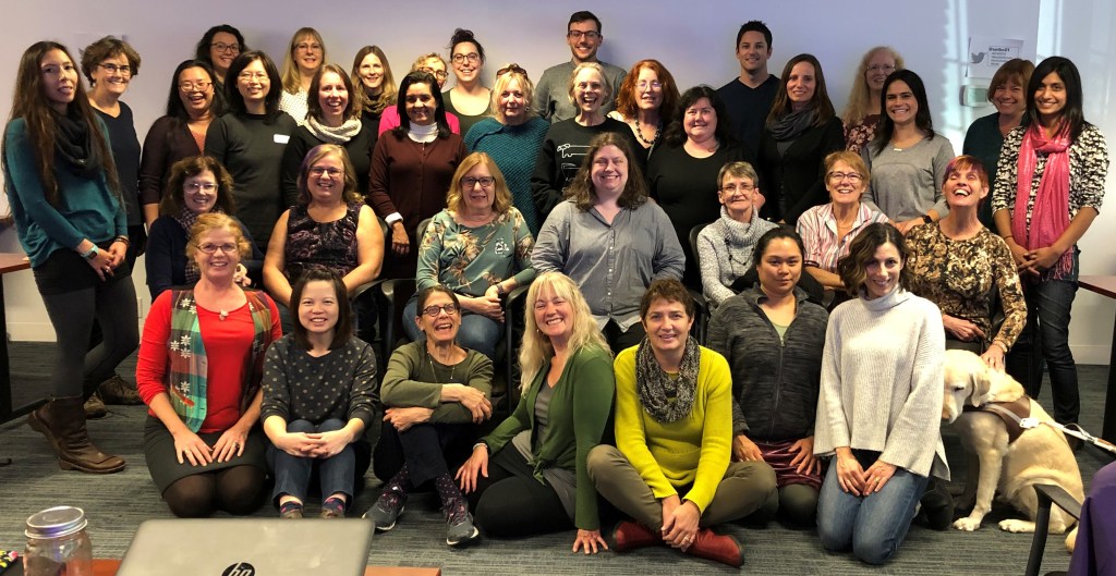 A group of teachers of students with visual impairments smiling after two days of great professional development